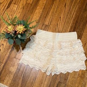 Cream crochet ruffle shorts w/ satin-like liner